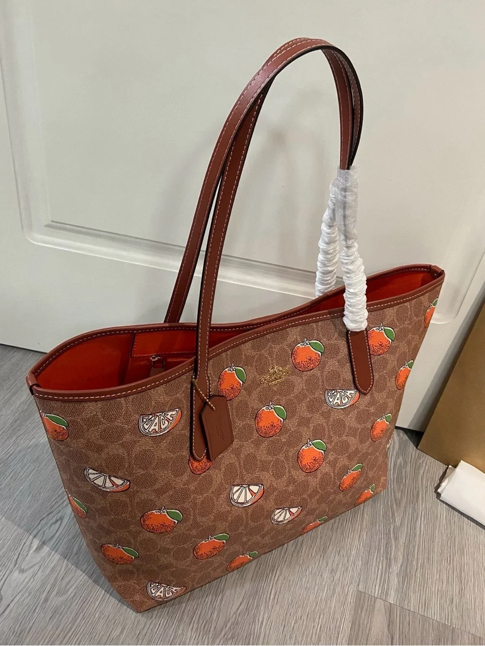 Coach Brown Canvas Tote with Orange Fruit Print